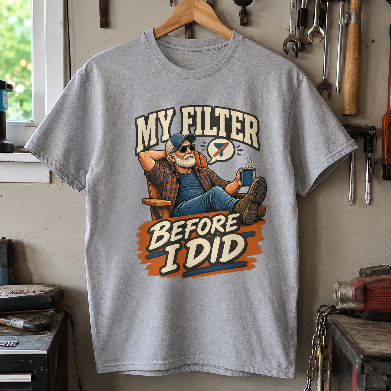 Gray vintage t-shirt hanging with printed My Filter Before I Did slogan and elderly man