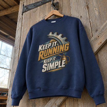 Navy vintage sweatshirt with Keep It Running. Keep It Simple printed design, hanging front view
