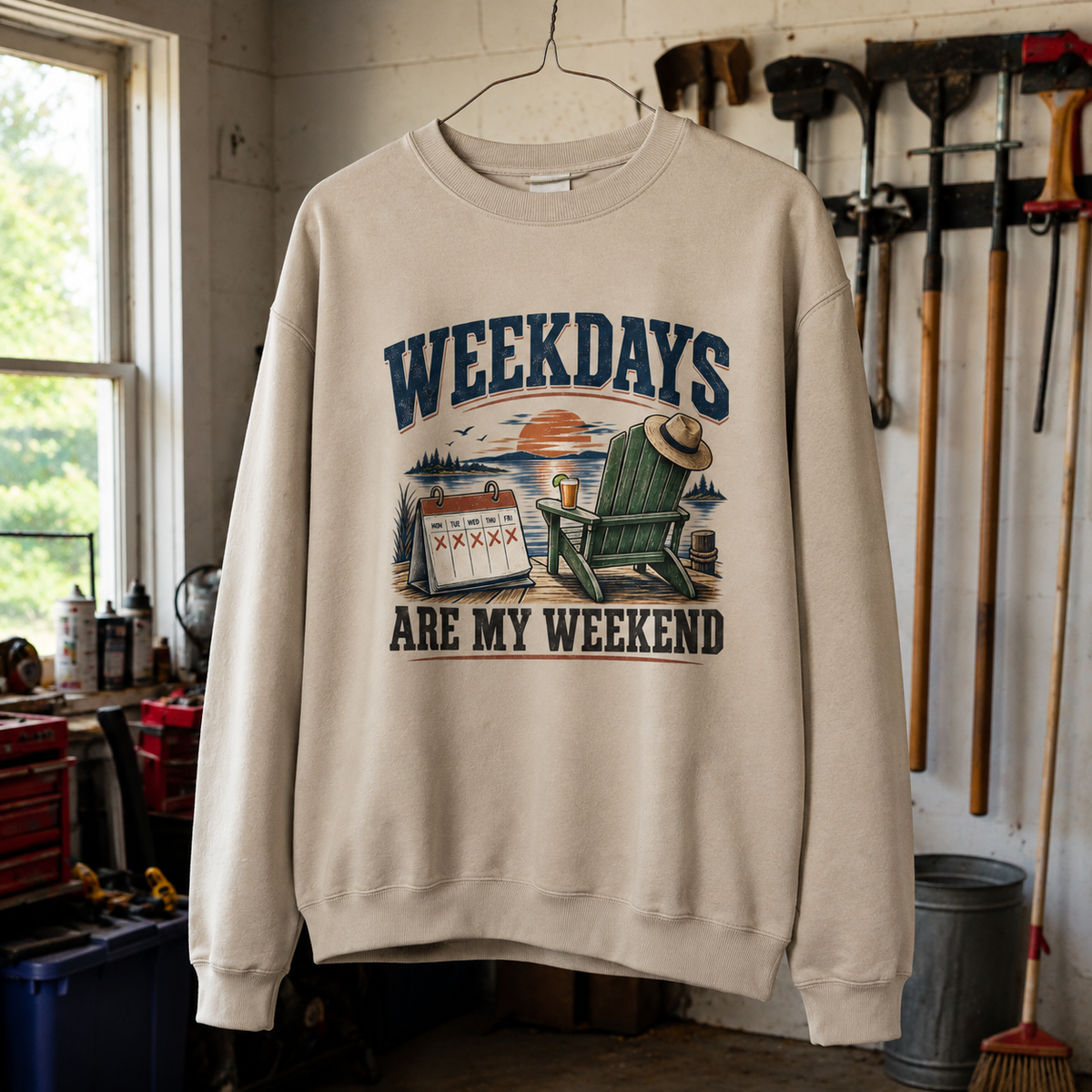 Cream vintage sweatshirt hanging with printed Weekdays Are My Weekend slogan and outdoor chair design