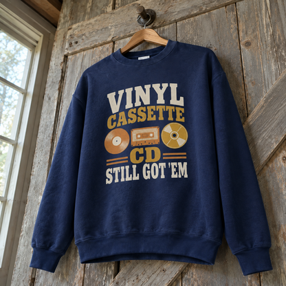 Navy vintage sweatshirt with printed Vinyl Cassette CD Still Got ’Em design, hanging front view