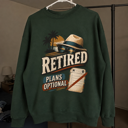Green vintage sweatshirt hanging with printed Retired Plans Optional design front view