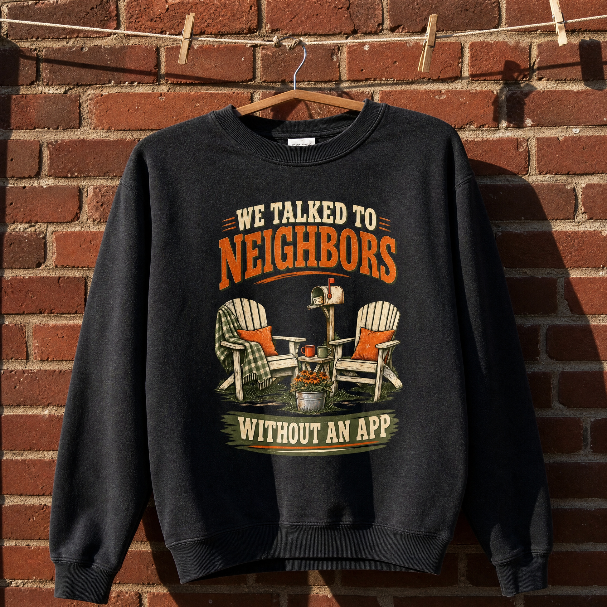 Black vintage sweatshirt hanging with printed “We Talked To Neighbors” design