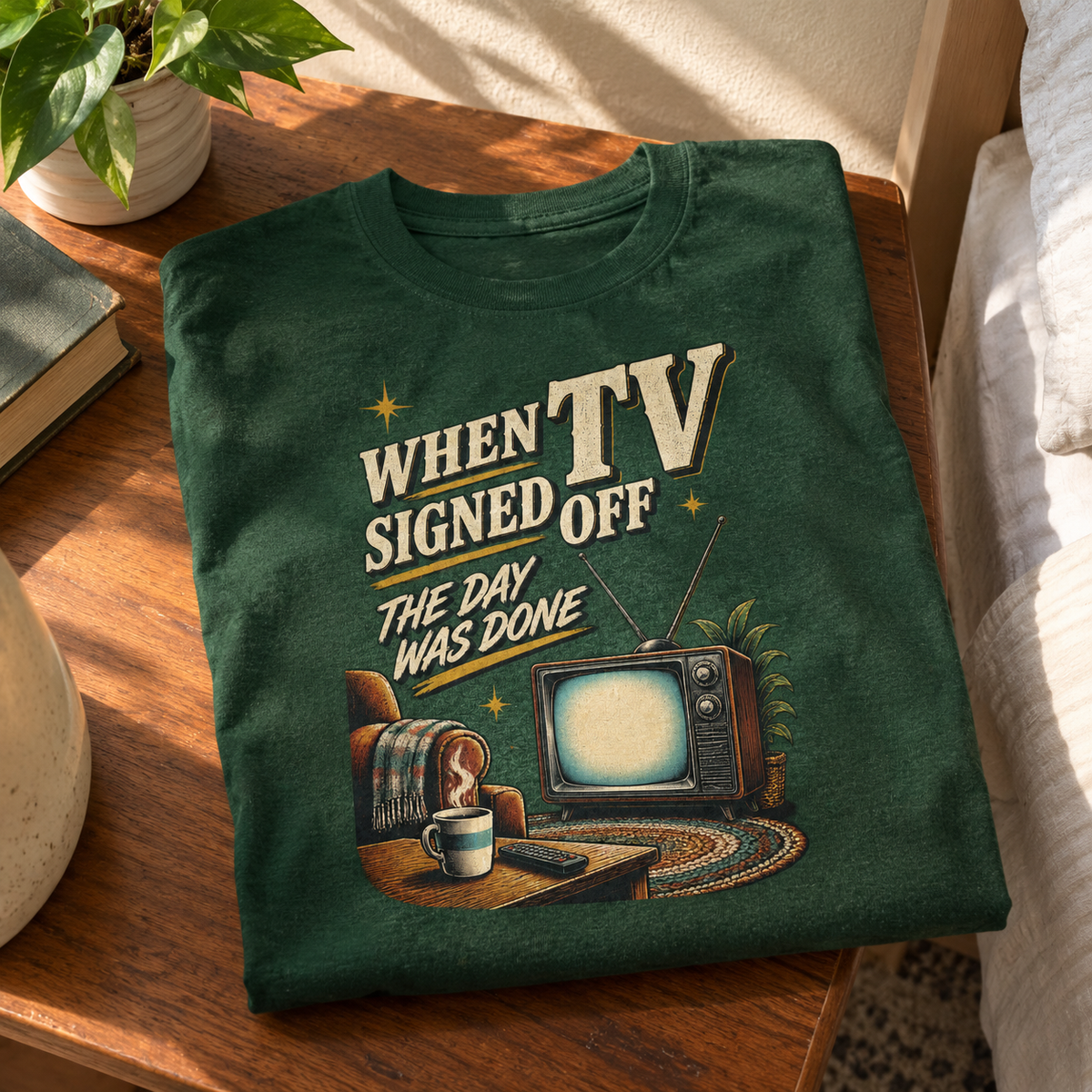 vintage t-shirt product shot with When TV Signed Off The Day Was Done printed design