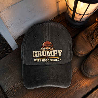 Vintage washed cap with printed Grumpy With Good Reason slogan on dark fabric hero view