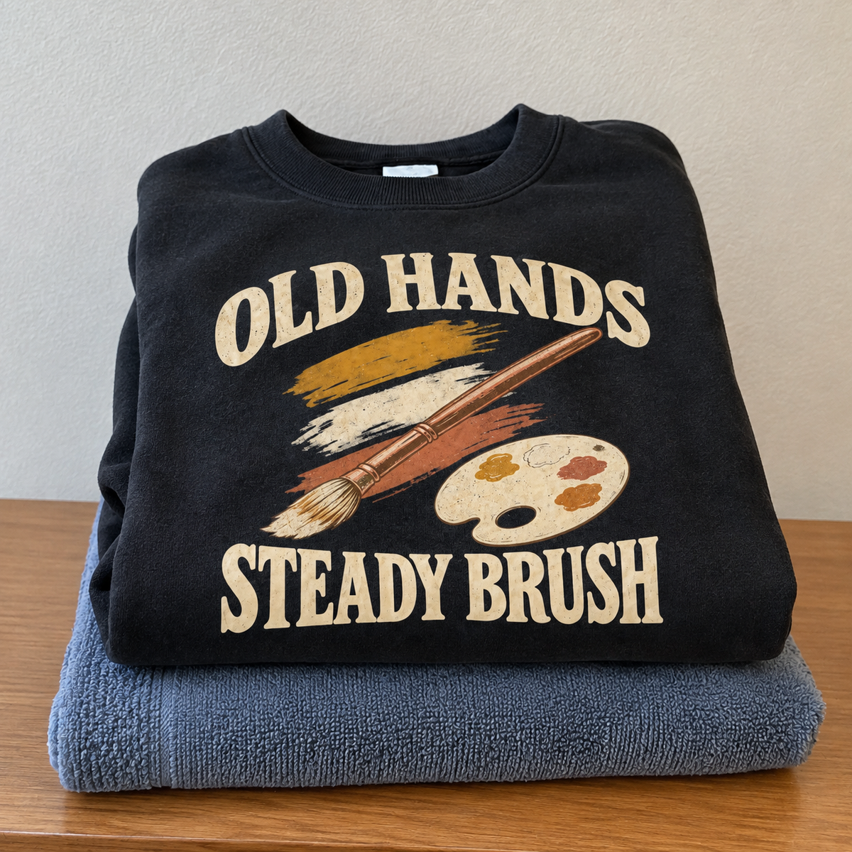 Black vintage sweatshirt with printed Old Hands Steady Brush paint, brush and palette design