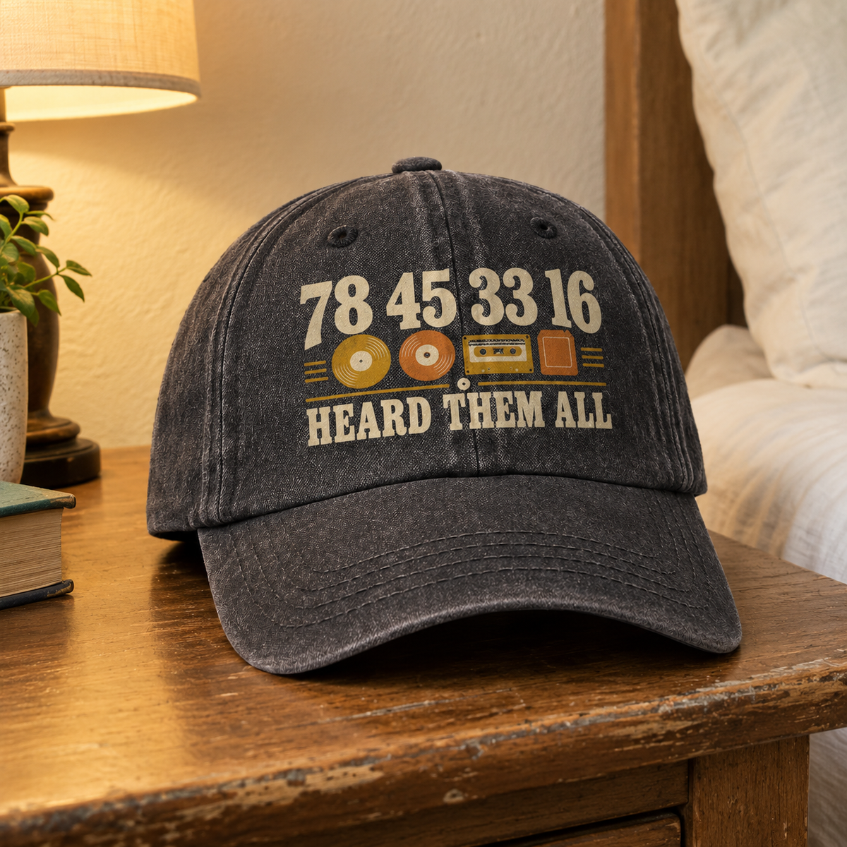 Black vintage washed cap with printed 7845 3316 Heard Them All retro music design on table