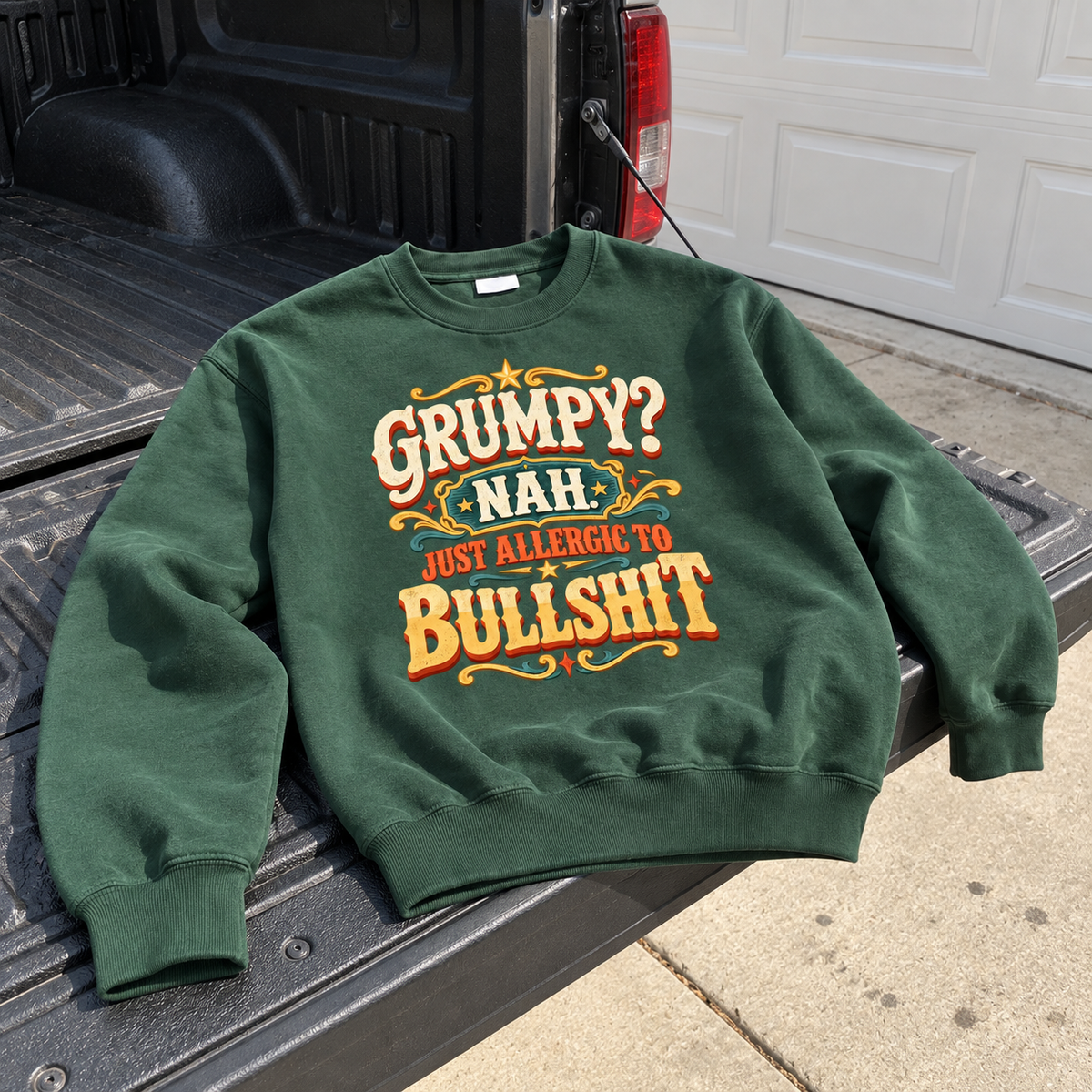 Green vintage sweatshirt with Grumpy? Nah. Just Allergic To Bullshit printed on front, laid on truck tailgate