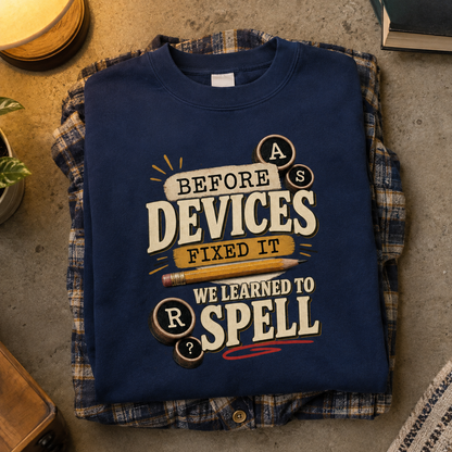 Navy vintage sweatshirt with printed “Before Devices Fixed It We Learned To Spell” design, hero view