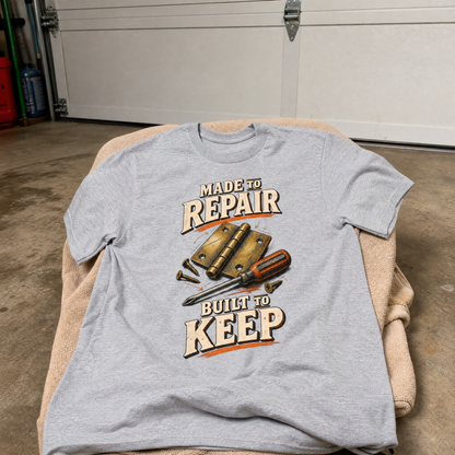 Gray vintage t-shirt with printed Made To Repair Built To Keep design, front view