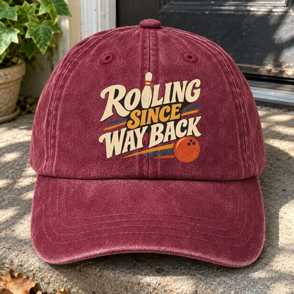 Burgundy vintage washed cap with printed Rolling Since Way Back slogan front view