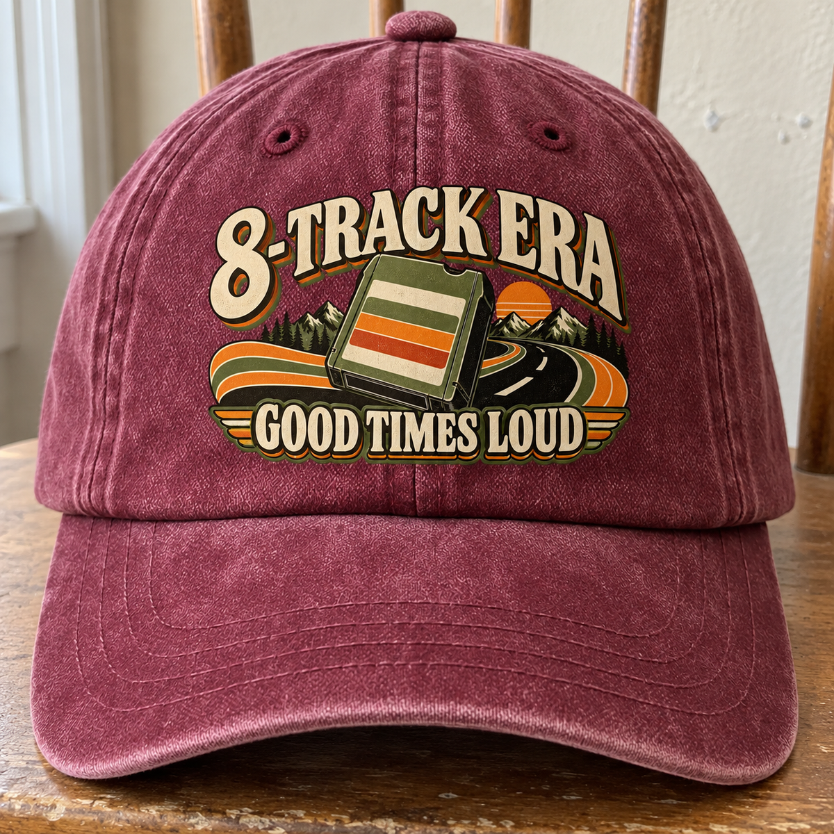 Front view of burgundy vintage washed cap with printed 8-Track Era Good Times Loud design