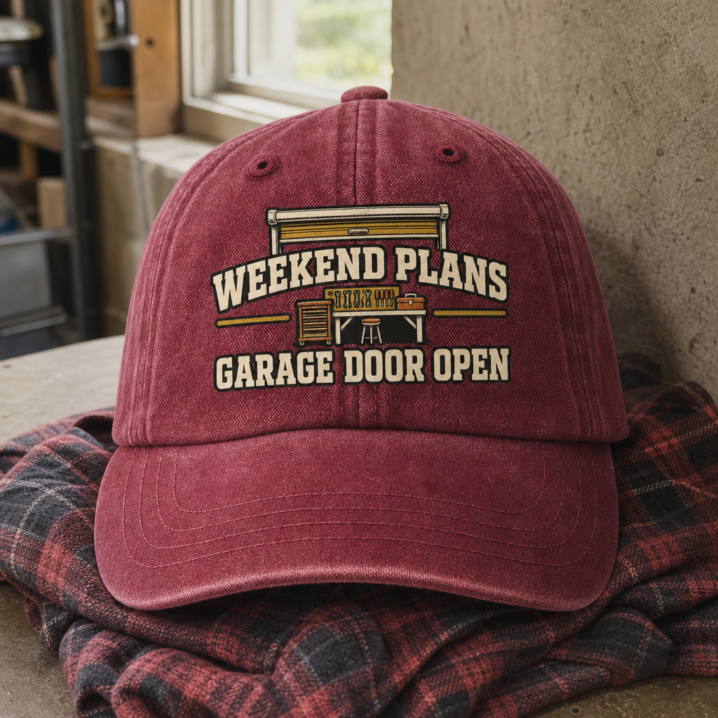 Burgundy vintage washed cap with printed Weekend Plans Garage Door Open design, front view