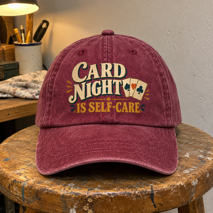 Burgundy vintage washed cap with printed Card Night Is Self-Care slogan and playing cards