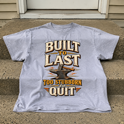 Gray vintage t-shirt with printed Built To Last Too Stubborn To Quit slogan on front