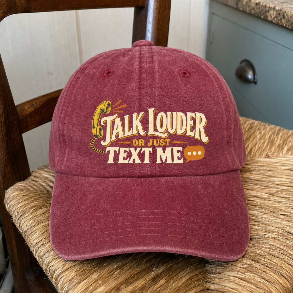 Burgundy vintage washed cap with printed “Talk Louder Or Just Text Me” slogan, front view.