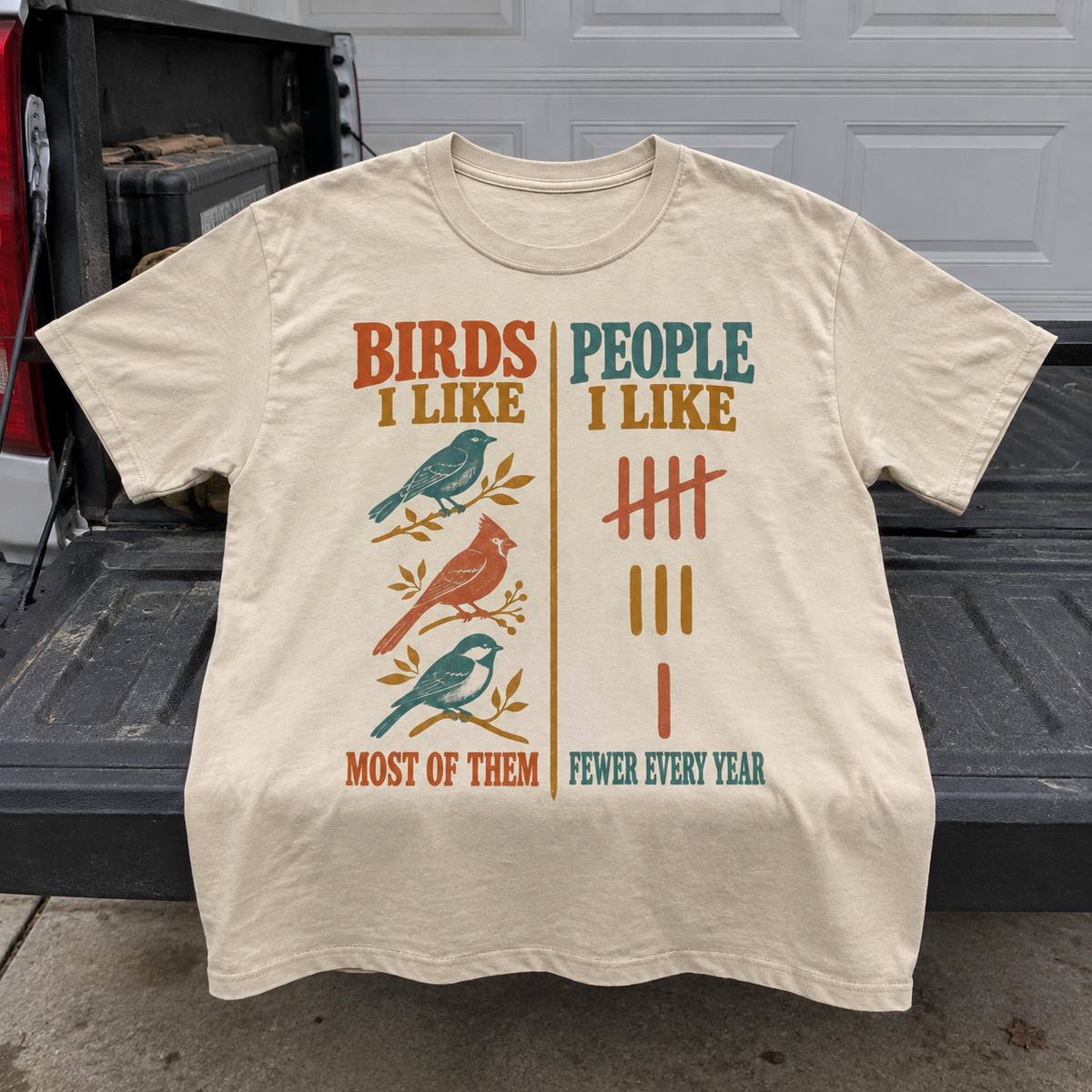 Cream vintage t-shirt with printed bird and people slogan design, front view