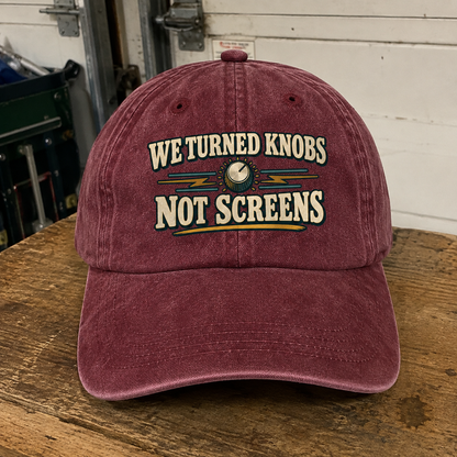 Vintage washed cap with printed We Turned Knobs Not Screens slogan in burgundy front view