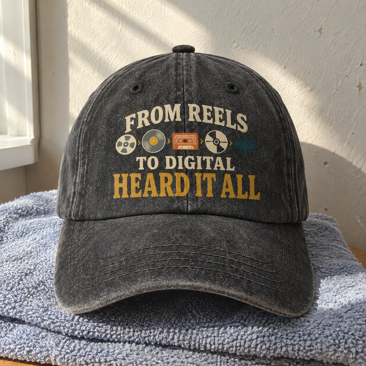 Black vintage washed cap with printed From Reels To Digital Heard It All slogan