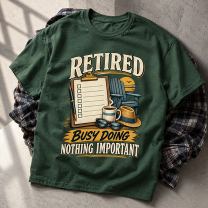 Green vintage t-shirt with printed Retired Busy Doing Nothing Important slogan and retirement design