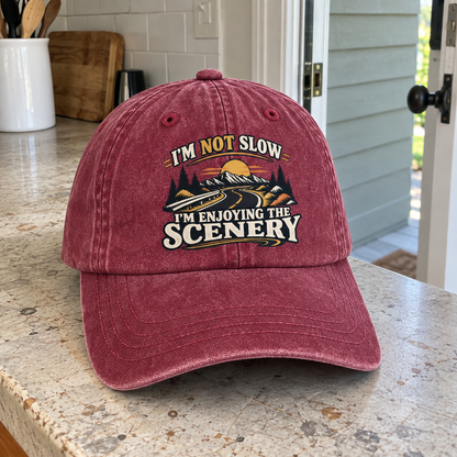 Burgundy vintage washed cap with printed mountains and I'm Not Slow I'm Enjoying The Scenery