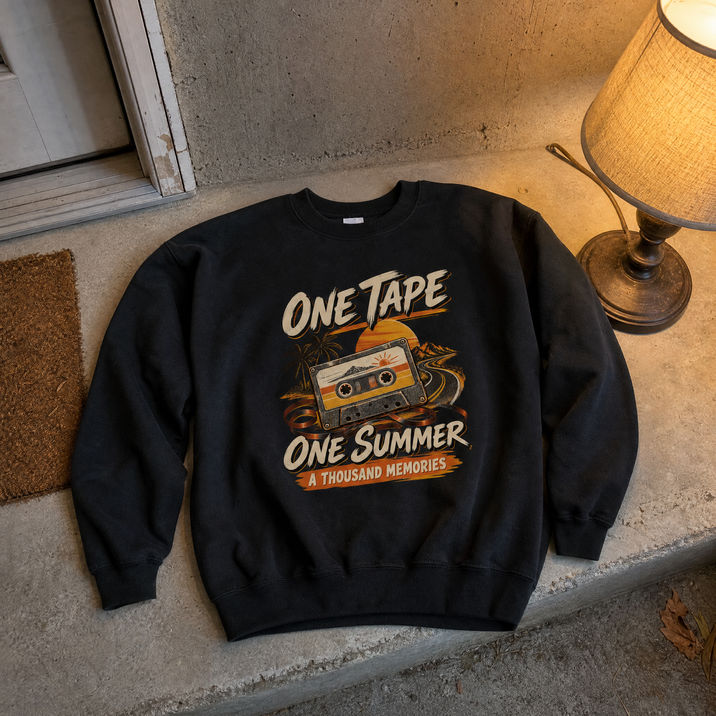 Black vintage sweatshirt with printed One Tape One Summer A Thousand Memories design, front view