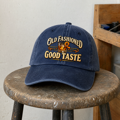 Navy vintage washed cap with printed Old Fashioned Good Taste whiskey design, front hero view