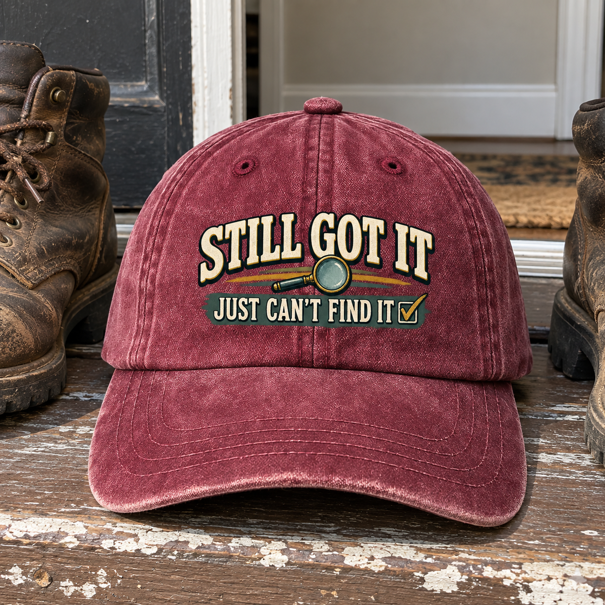 Burgundy vintage washed cap with printed Still Got It Just Can't Find It slogan