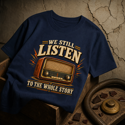 Navy vintage t-shirt with printed “We Still Listen To The Whole Story” radio design, hero view.