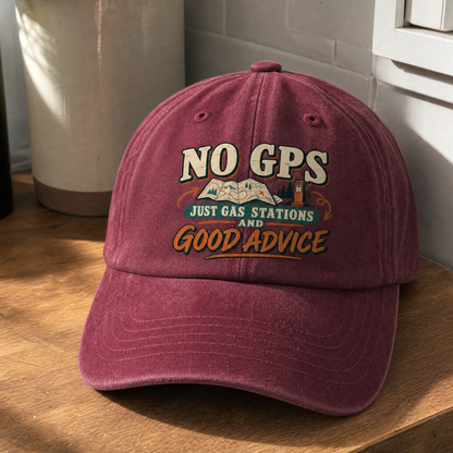 Burgundy vintage washed cap with printed “No GPS Just Gas Stations And Good Advice” slogan