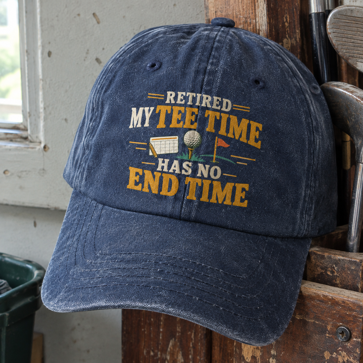 Navy vintage washed cap with printed golf design and Retired. My Tee Time Has No End Time slogan