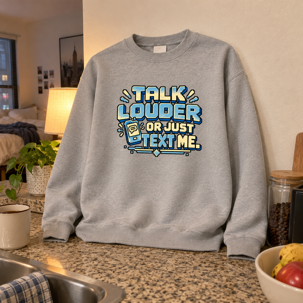Gray vintage sweatshirt with printed Talk Louder Or Just Text Me slogan and phone