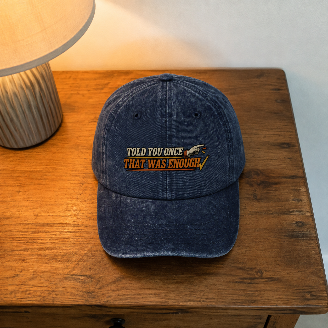 Vintage washed cap in dark blue with printed Told You Once That Was Enough slogan