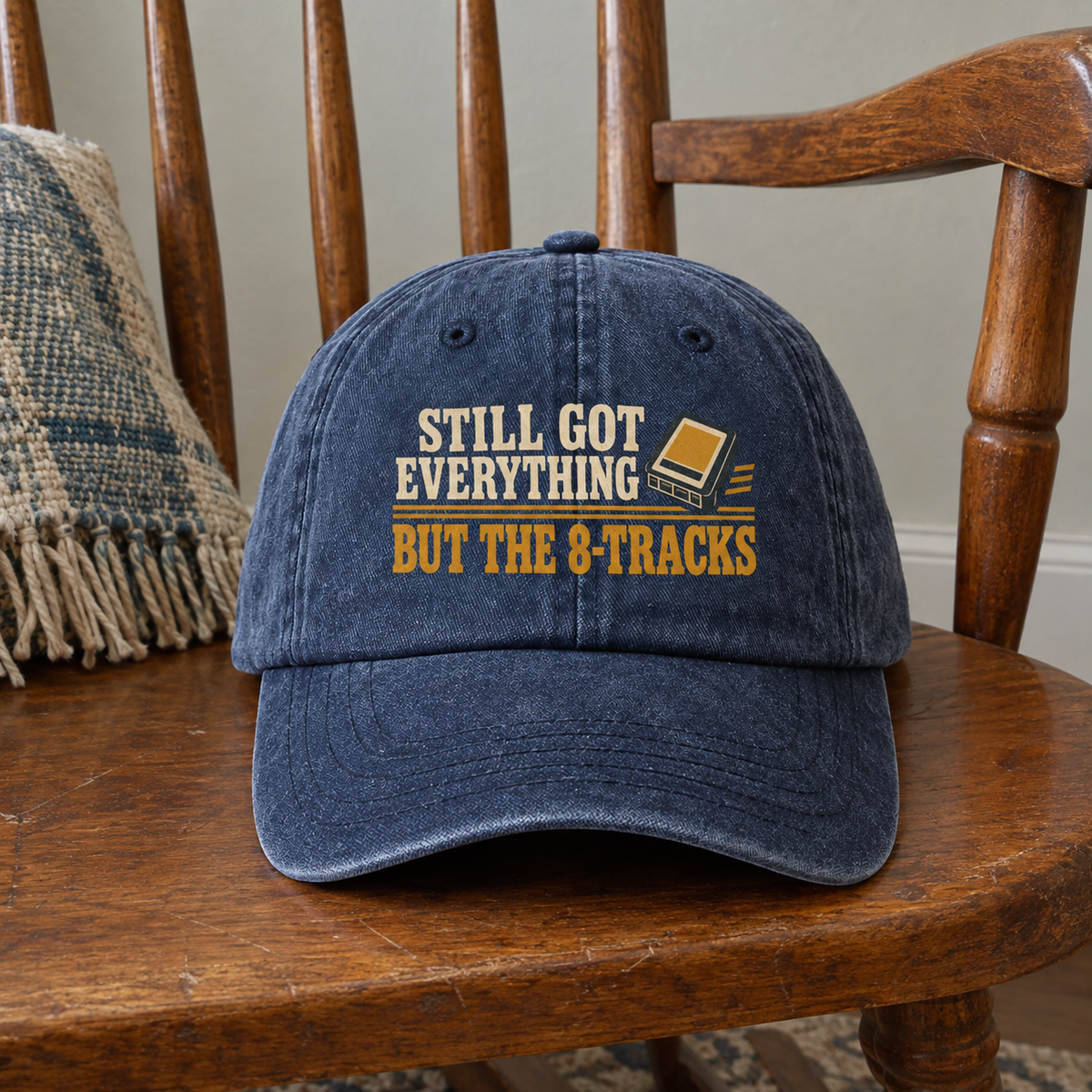 Vintage washed cap in navy with printed Still Got Everything But The 8-Tracks slogan, front view