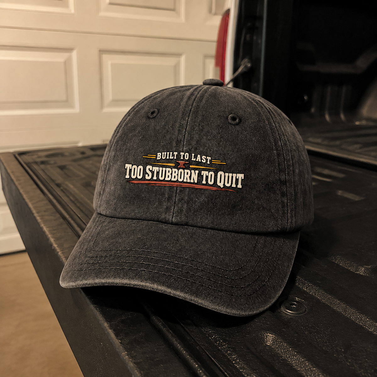 Black vintage washed cap with printed Built To Last Too Stubborn To Quit design