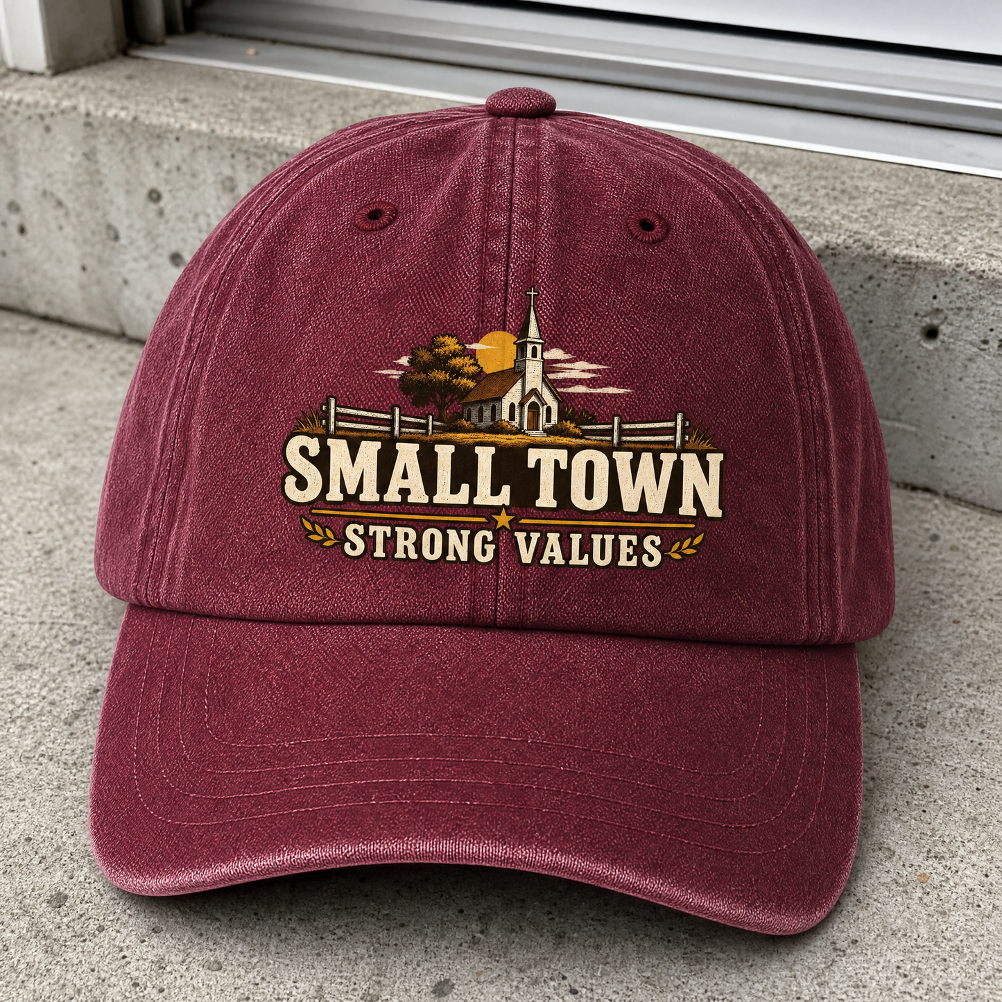 Burgundy vintage washed cap with printed Small Town Strong Values church design, front view