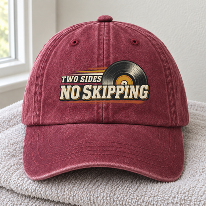 Burgundy vintage washed cap with printed Two Sides. No Skipping slogan, front hero view