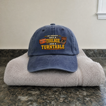 Vintage washed cap featuring printed “33 toolbox and turntable” design, hero view