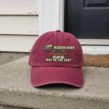 Burgundy vintage washed cap with printed Window Down Radio Up slogan, front view