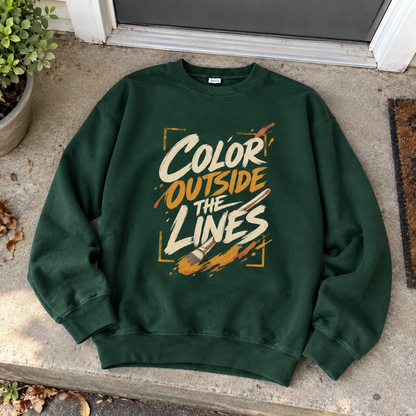 Dark green vintage sweatshirt with printed Color Outside the Lines design and paintbrush graphic

Would you like a shorter