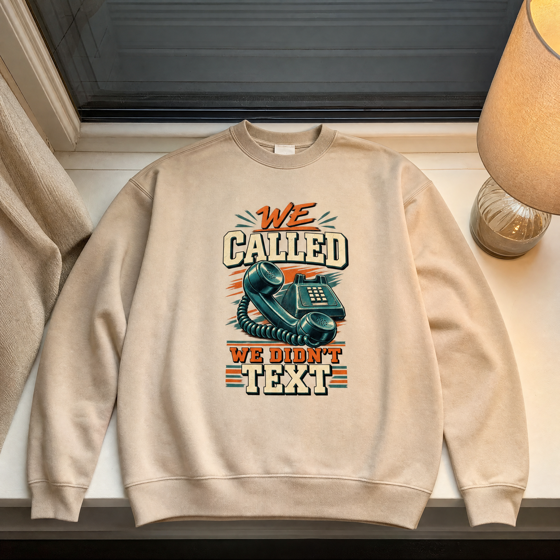 Beige vintage sweatshirt with printed “WE CALLED WE DIDN’T TEXT” telephone design, front view.