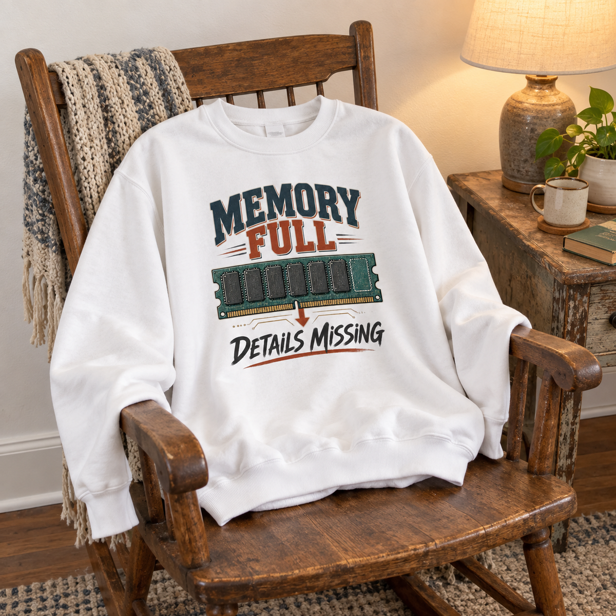 White vintage sweatshirt with printed Memory Full Details Missing graphic on wooden chair