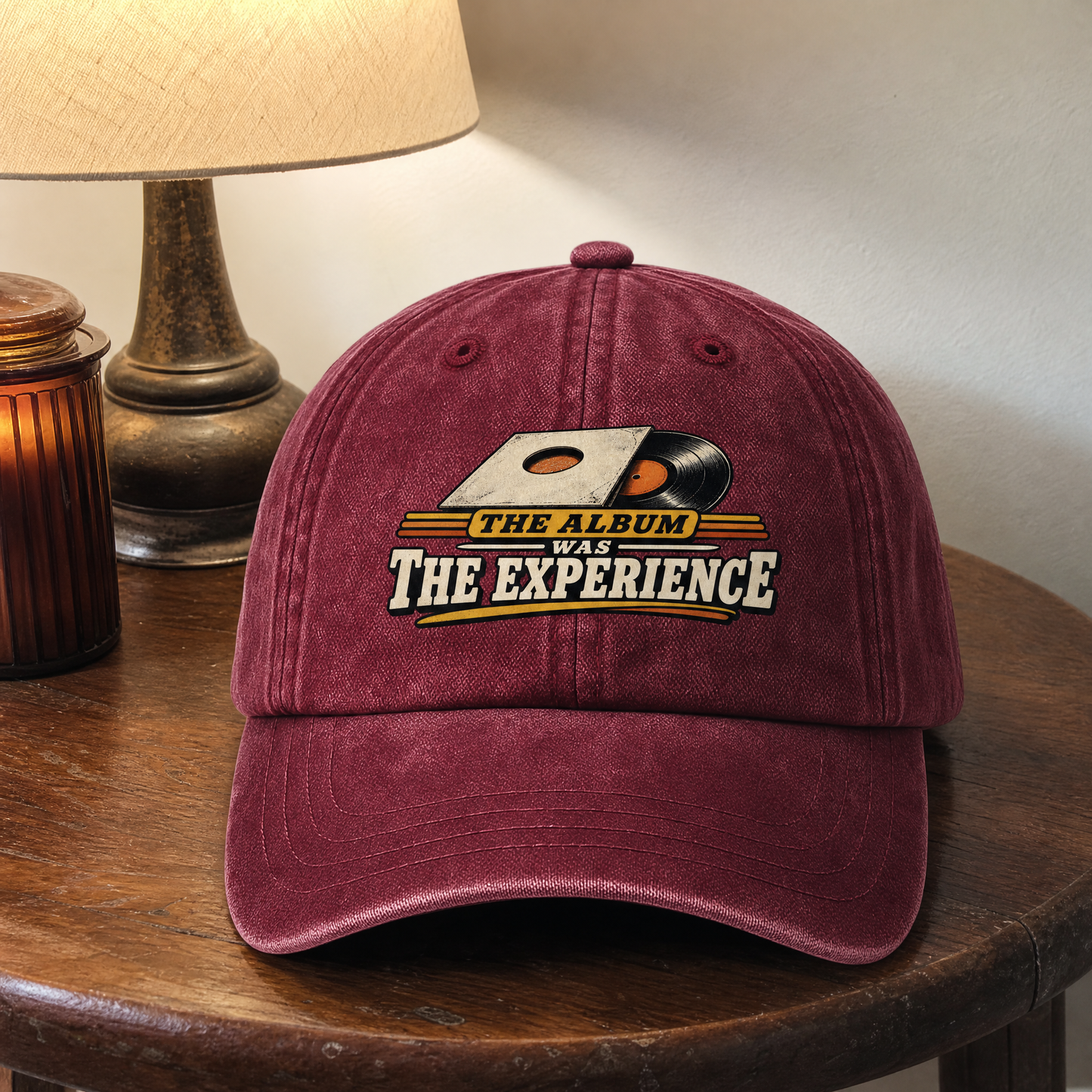 Burgundy vintage washed cap with printed The Album Was The Experience design, front hero view.