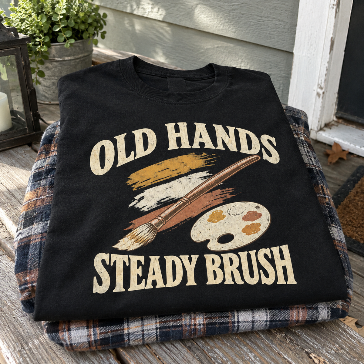 Black vintage t-shirt with printed Old Hands Steady Brush slogan and paintbrush design hero view