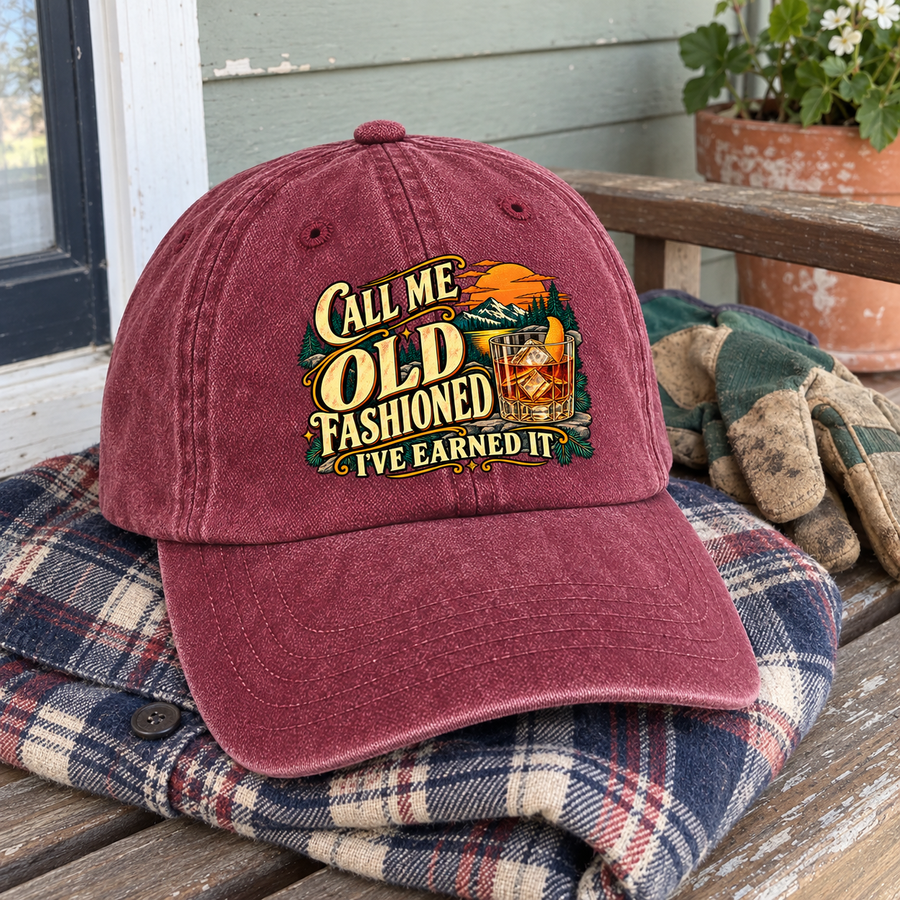 Burgundy vintage washed cap with printed Call Me Old Fashioned I’ve Earned It slogan