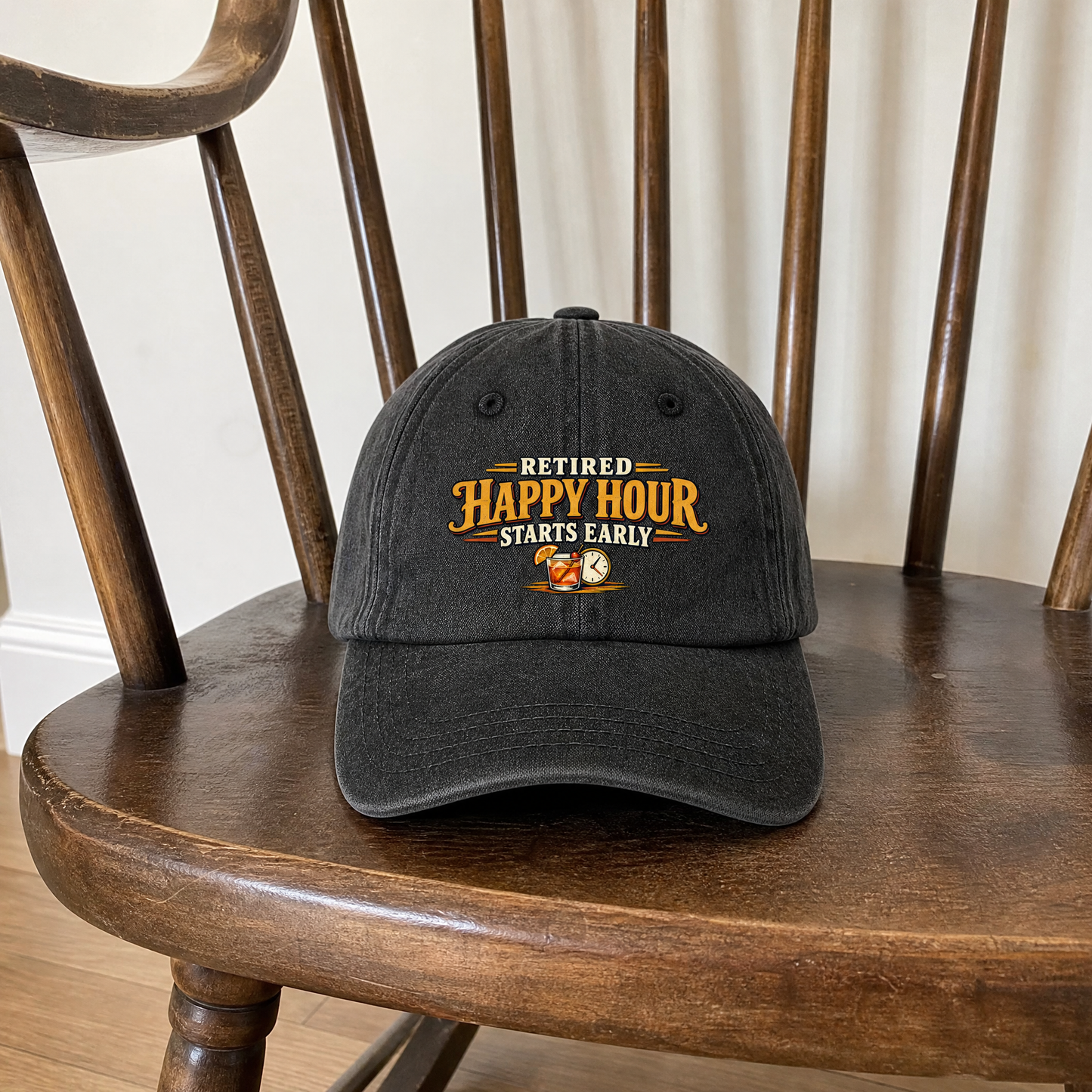 Black vintage washed cap with printed Retired Happy Hour Starts Early slogan, front view.