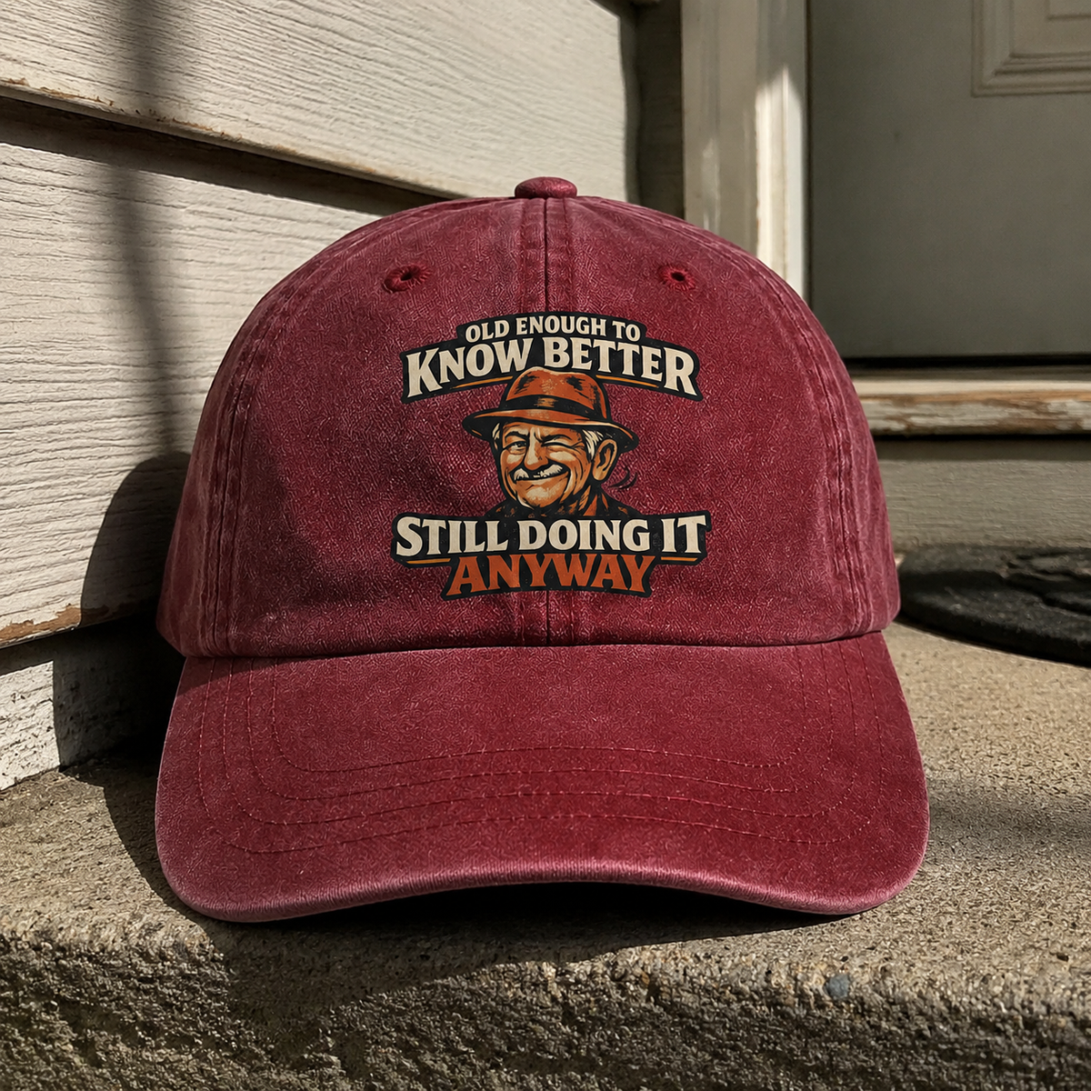 Burgundy vintage washed cap with printed Old Enough To Know Better slogan