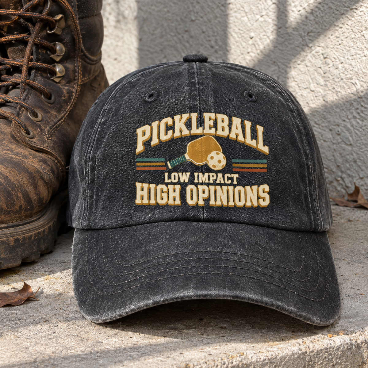 Black vintage washed cap with printed Pickleball Low Impact High Opinions slogan, front view