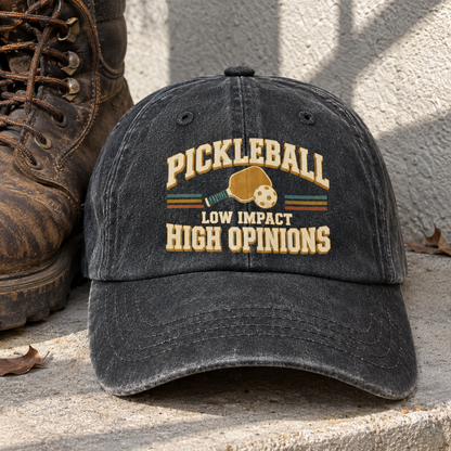 Black vintage washed cap with printed Pickleball Low Impact High Opinions slogan, front view