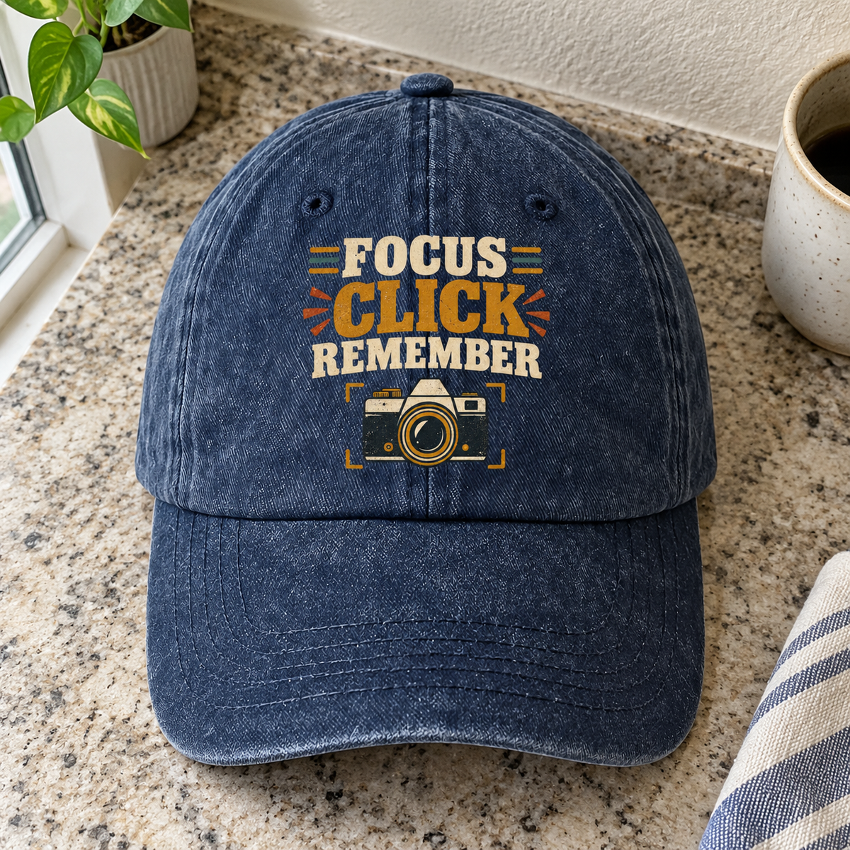 Navy vintage washed cap with Focus Click Remember printed slogan and camera graphic, front hero view