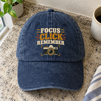 Navy vintage washed cap with Focus Click Remember printed slogan and camera graphic, front hero view